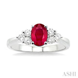 7x5mm Oval Cut Ruby and 1/3 ctw Round Cut Diamond Ring in 14K White Gold