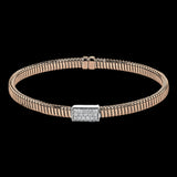 18k Rose gold textured bangle is highlighted by .25 ctw of diamonds set in a rectangular design. Perfect for stacking