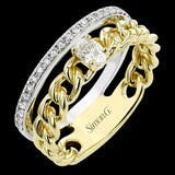 This modern right hand ring from our chain link collection, combines two looks & features a 0.21 ctw oval diamond set in yellow gold links, lined by a white gold band of RD diamonds 0.20 ctw.
