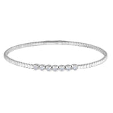 platinum finish sterling silver flexible bracelet with 7 bezel set simulated diamonds