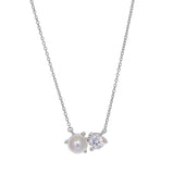 Platinum finish sterling silver necklace with a simulated pearl and a round simulated diamond on 16-18 adjustable chain