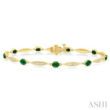 1/4 ctw Oval Cut 4X3 MM Emerald and Round Cut Diamond Precious Bracelet in 10K Yellow Gold