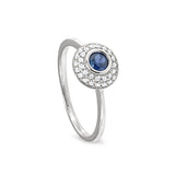 Platinum finish sterling silver micropave ring with synthetic blue sapphire and simulated diamonds