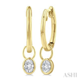 1/3 Ctw Bezel Set Oval Cut Diamond Huggie Earrings in 10K Yellow Gold