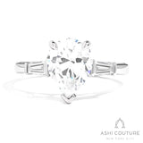 Bridal 3-Stone Pear Semi-Mount Engagement Ring With Tapered Baguette Side Diamonds in White Gold