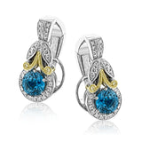 These glamorous two-tone gold earrings feature a stunning 2.07 ctw of blue zircon centerpieces against .30 ctw of white diamond halos and accents