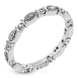 This 18k white gold band is perfect for layering with others, or could also be used unique wedding band, and contains .31 ctw of white diamonds. Perfect for stacking.