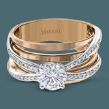 This modern, two-tone 18k gold engagement ring setting contains .18 ctw of white diamonds in white gold, which accent the main rose gold section of the ring.