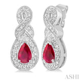 5x3 MM Pear Shape Ruby and 1/20 Ctw Round Cut Diamond Earrings in Sterling Silver