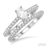 3/4 Ctw Diamond Wedding Set With 5/8 ct Oval Shape Diamond Engagement Ring and 1/6 ct Wedding Band in 14K White Gold