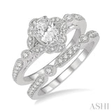 3/4 ctw Round Cut Diamond Wedding Set With 5/8 ctw Oval Cut Floral Engagement Ring and 1/10 ctw Lattice Wedding Band in 14K White Gold