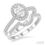 7/8 Ctw Diamond Wedding Set With 3/4 Ctw Oval Shape Engagement Ring and 1/6 Ctw Wedding Band in 14K White Gold