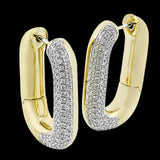 An every day classic, these 18K white and yellow gold earrings feature .79cttw diamonds.
