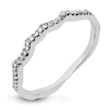 This impressive contemporary white engagement ring features a unique twisting design on the shank, which is complemented by .17 ctw of round cut white diamonds.